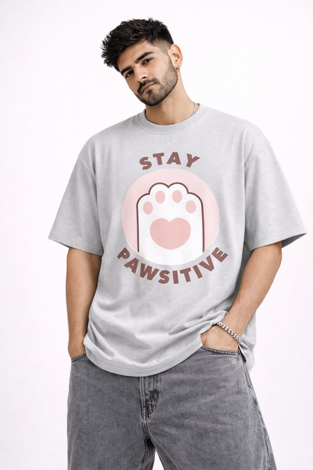 Stay Pawsitive Oversized Graphic T-Shirt – Light Grey | Cute Paw Print Unisex Streetwear Tee